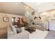 Open-concept living room with vaulted ceilings, modern decor, and ample natural light at 102 S High St, Breckenridge, CO 80424
