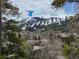 Panoramic mountain views from this home offering a glimpse of the slopes and town below at 102 S High St, Breckenridge, CO 80424