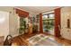 Bright office space featuring hardwood floors, colorful decor, and an outdoor view at 102 S High St, Breckenridge, CO 80424