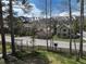 A quaint neighborhood street featuring mature trees and mountain views at 102 S High St, Breckenridge, CO 80424