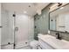 Stylish bathroom featuring a glass shower, modern vanity, and sleek fixtures at 1298 Silverheels Dr, Larkspur, CO 80118