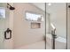 Beautiful bathroom with a standalone tub, glass shower, and modern, minimalist design at 1298 Silverheels Dr, Larkspur, CO 80118