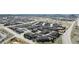 Wide aerial shot of residential complex nestled in open landscape with mountain views at 452 Black Feather Loop # 606, Castle Rock, CO 80104