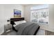 Cozy bedroom with a large window and stylish black bed frame at 452 Black Feather Loop # 606, Castle Rock, CO 80104