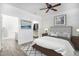Spacious bedroom features hardwood floors, a walk-in closet, and an ensuite bathroom for added convenience at 452 Black Feather Loop # 606, Castle Rock, CO 80104