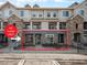 Charming first-floor condo featuring stone accents and a welcoming entryway at 452 Black Feather Loop # 606, Castle Rock, CO 80104