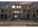 Inviting condo exterior with well-maintained landscaping and attractive architectural details at 452 Black Feather Loop # 606, Castle Rock, CO 80104