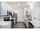 Well-appointed kitchen with stainless steel appliances and ample counter space at 452 Black Feather Loop # 606, Castle Rock, CO 80104