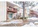 Exterior building elevation featuring private patios and balconies at 1128 S Ventura Cir # B, Aurora, CO 80017
