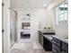 Main bathroom with walk-in shower and double vanity at 1123 Williams Loop, Elizabeth, CO 80107