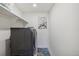 Laundry room with washer, dryer, and shelving at 1123 Williams Loop, Elizabeth, CO 80107