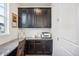 Functional home office with built-in desk and cabinets at 1123 Williams Loop, Elizabeth, CO 80107