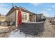 Backyard featuring a stone bar, patio, and cozy sitting area for relaxation and entertainment at 11884 Barrentine Loop, Parker, CO 80138