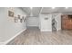 Spacious basement hallway with access to the living area, bedroom, and storage at 11884 Barrentine Loop, Parker, CO 80138