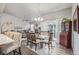 Dining area featuring a modern table setting and a view of the living room at 11884 Barrentine Loop, Parker, CO 80138