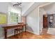 Bedroom featuring a study nook with a wooden desk and a window bringing in natural light at 134 S 5Th Ave, Brighton, CO 80601