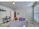 Simple bedroom with a bed, desk and window at 1143 Williams Loop, Elizabeth, CO 80107