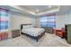 Charming bedroom with a queen-size bed and window at 1143 Williams Loop, Elizabeth, CO 80107