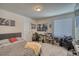 Cozy bedroom with a bed, desk, and chair at 1143 Williams Loop, Elizabeth, CO 80107