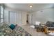 Bright bedroom with double doors leading to a walk-in closet at 1143 Williams Loop, Elizabeth, CO 80107