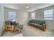 Bedroom with a futon, chair and ottoman, carpeted floor, and window blinds at 1143 Williams Loop, Elizabeth, CO 80107