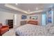 Bright bedroom featuring a plush bed and ample space at 1143 Williams Loop, Elizabeth, CO 80107