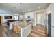 Modern kitchen with granite island and stainless steel appliances at 1143 Williams Loop, Elizabeth, CO 80107