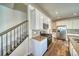 Modern kitchen with white cabinets and granite countertops at 1143 Williams Loop, Elizabeth, CO 80107