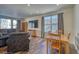 Spacious living area with hardwood floors and large windows at 1143 Williams Loop, Elizabeth, CO 80107