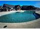 Community swimming pool with surrounding lounge area at 1143 Williams Loop, Elizabeth, CO 80107