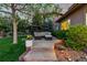 Beautiful backyard patio with comfortable seating area at 6874 Raspberry Run, Littleton, CO 80125