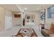 Spacious finished basement with a relaxation area, workout space, and neutral decor at 6874 Raspberry Run, Littleton, CO 80125