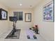 Finished basement gym area featuring exercise equipment and ample space at 6874 Raspberry Run, Littleton, CO 80125