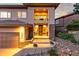 Charming front of the house featuring a balcony and a well maintained yard at 6874 Raspberry Run, Littleton, CO 80125