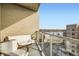 Relaxing balcony featuring comfortable seating and views of the water at 4200 W 17Th Ave # 611, Denver, CO 80204