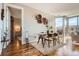 Contemporary dining area with a glass table, stylish chairs, and plenty of natural light at 4200 W 17Th Ave # 611, Denver, CO 80204