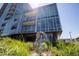 Stunning modern building with glass windows and artistic sculpture at 4200 W 17Th Ave # 611, Denver, CO 80204