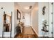 Inviting hallway with hardwood floors, decorative mirror, stylish decor and a warm, welcoming atmosphere at 4200 W 17Th Ave # 611, Denver, CO 80204