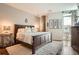 Cozy main bedroom featuring a king-size bed, decorative lighting, and a serene ambiance at 4200 W 17Th Ave # 611, Denver, CO 80204