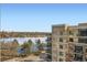 Beautiful view from the apartment showing the lake and tennis courts at 4200 W 17Th Ave # 611, Denver, CO 80204