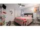 Cozy bedroom featuring comfortable bedding, decor, and natural light at 22778 E Alamo Ln, Aurora, CO 80015