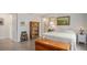 Cozy bedroom featuring wood floors, light gray walls and a comfy bed at 22778 E Alamo Ln, Aurora, CO 80015