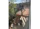 Back deck with stairs leading to a patio and backyard with a barbecue grill at 22778 E Alamo Ln, Aurora, CO 80015