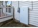 Exterior view of the home showing the Tesla Powerwall battery system on the side of the house at 2666 S Green Ct, Denver, CO 80219