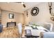 Cozy dining room with a modern table, ceiling fan, and hardwood floors at 10555 Boston St, Commerce City, CO 80640