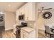 Modern kitchen features stainless steel appliances, granite countertops, and subway tile backsplash at 10555 Boston St, Commerce City, CO 80640
