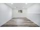 Finished basement with recessed lighting and laminate flooring throughout at 11172 W Exposition Dr, Denver, CO 80226