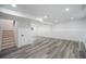 Finished basement with recessed lighting and laminate flooring throughout at 11172 W Exposition Dr, Denver, CO 80226