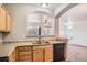 Charming kitchen with stainless steel appliances and a pass-through to the living room at 12711 Colorado Blvd # 607F, Thornton, CO 80241