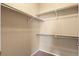 Walk-in closet with shelving, providing ample storage space at 2662 S Cathay Way # 112, Aurora, CO 80013